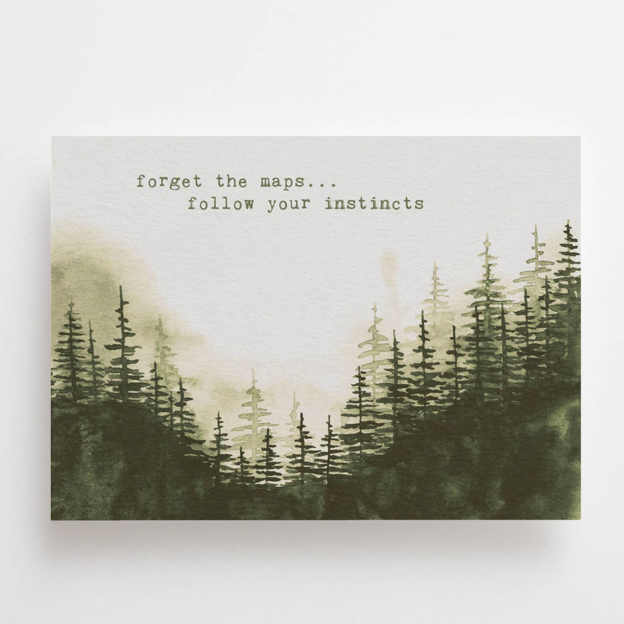 Framed artwork with a forest silhouette and motivational quote on a white background