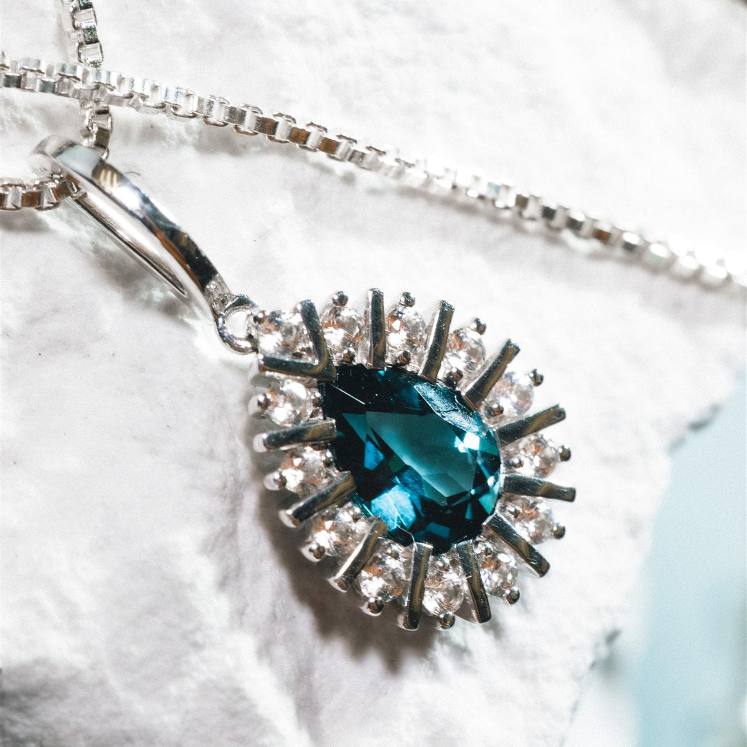 Silver pendant with london blue topaz stone