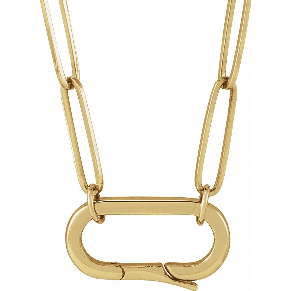 Gold necklace with a large, open-link clasp on a white background