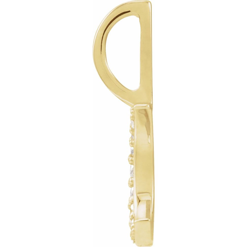 Gold earring with small diamonds on a white background