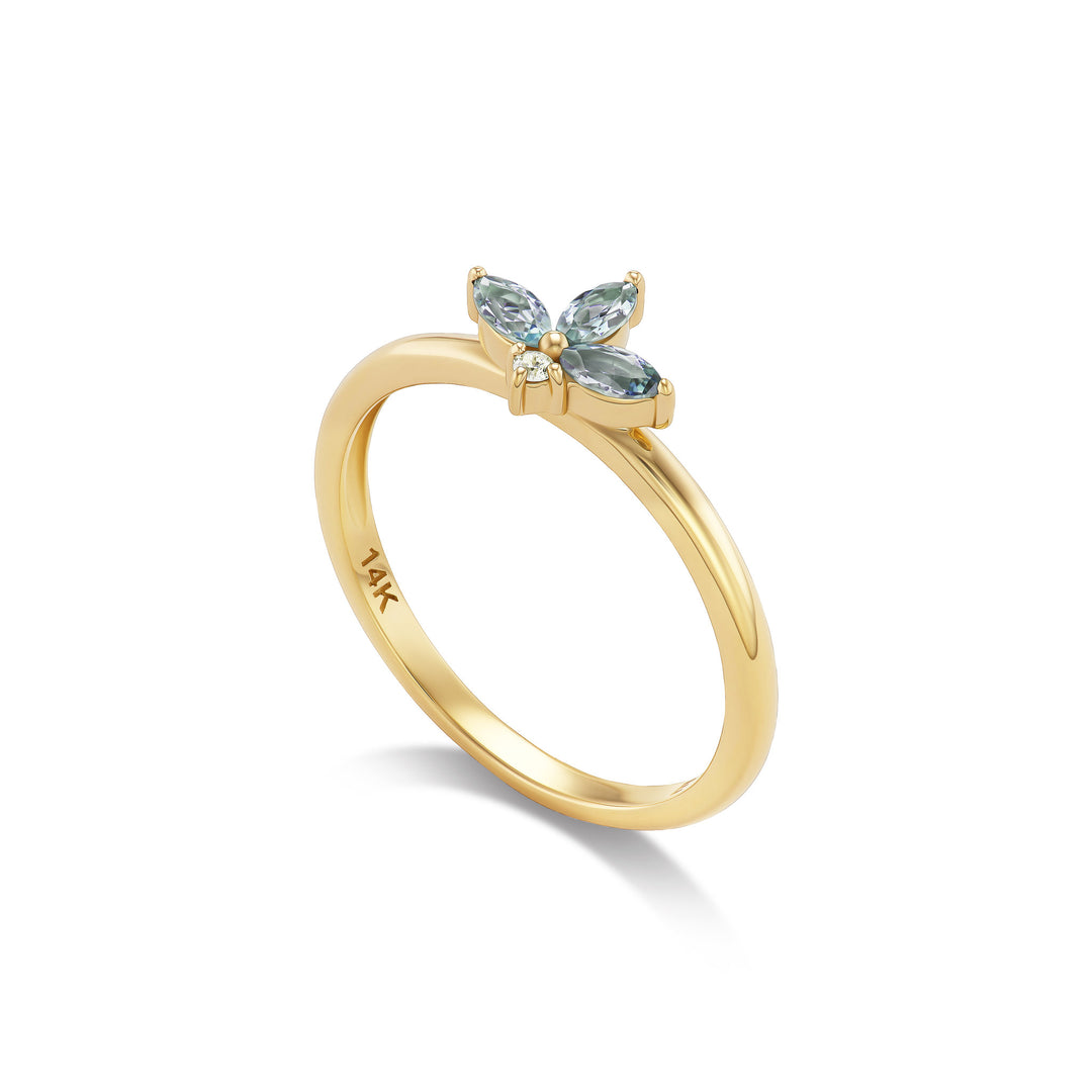 Vesper ring, solid 14K yellow gold, three marquise denim blue Montana sapphires with a round diamond, angled, ring — Talismania