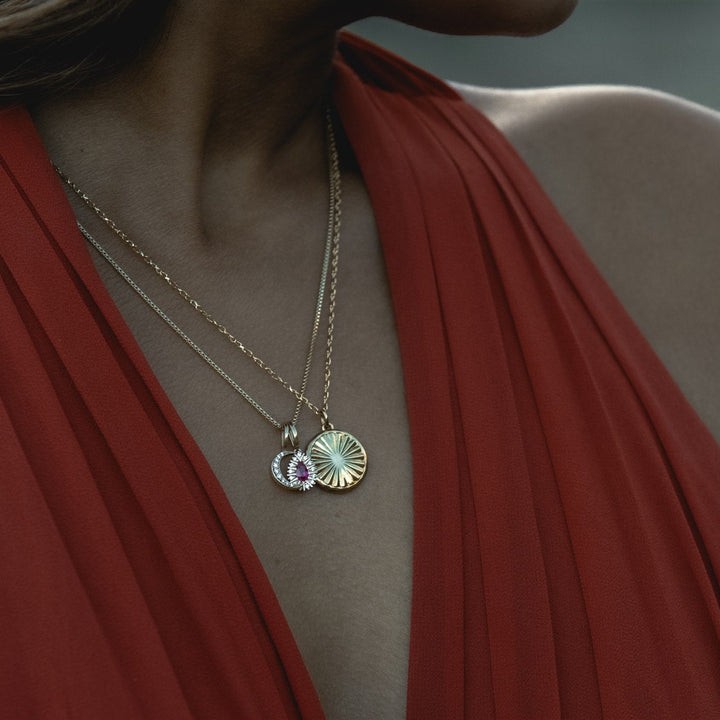 Talismania charm stack with the Wildfire petite pendant in solid 14K gold, worn — Talismania